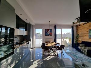 Kuchyňa alebo kuchynka v ubytovaní Apartament Madlen Art