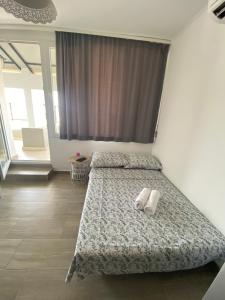 Posteľ alebo postele v izbe v ubytovaní Golden View Penthouse