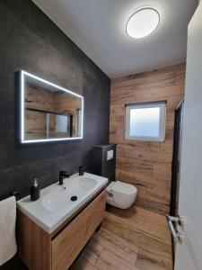 Koupelna v ubytování Apartman Lovre + 14 fotografií
