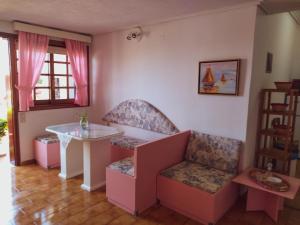 Posedenie v ubytovaní Ostria Apartments Kalives