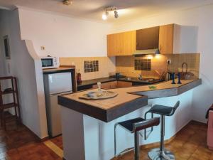 Kuchyňa alebo kuchynka v ubytovaní Ostria Apartments Kalives