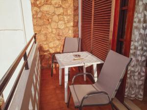 Posedenie v ubytovaní Ostria Apartments Kalives