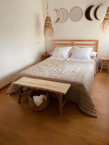 Ένα ή περισσότερα κρεβάτια σε δωμάτιο στο Las Ocas Boutique Apartamento - solo adultos