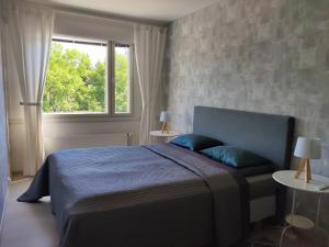 Postel nebo postele na pokoji v ubytování Nika Apartments