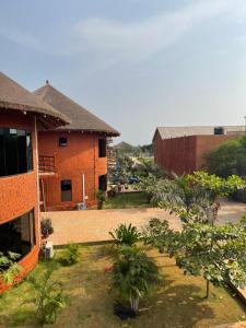 a view of the courtyard of a building at Marcelo Beach Club in Lomé