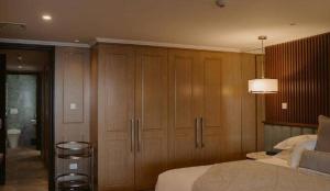 Voodi või voodid majutusasutuse The Carlin Boutique Hotel toas