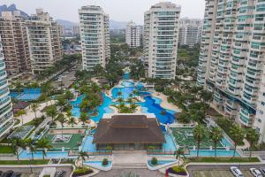 an aerial view of a resort with pools and buildings at Temporada RJ Bora Bora Resort in Rio de Janeiro