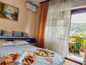 Voodi või voodid majutusasutuse Guesthouse DONA toas
