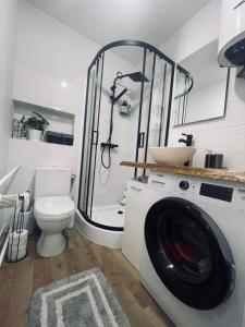 Koupelna v ubytování Moderna Apartament