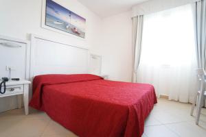 Postel nebo postele na pokoji v ubytování HOTEL PIGALLE