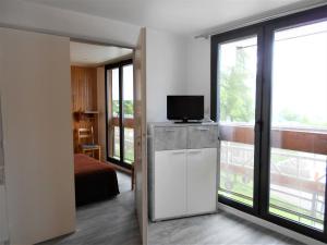 Fotografia z galérie ubytovania Appartement rénové, accès direct pistes, piscine, animaux admis - FR-1-267-228 v destinácii Le Corbier