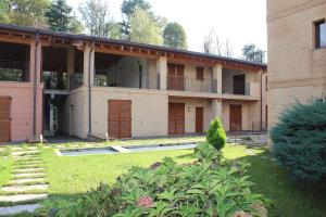 A garden outside Maison d'Elite