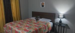 A bed or beds in a room at Oak Villa Montego Bay 2