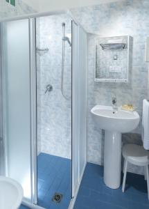 a bathroom with a sink and a shower at Hotel Boston in Cattolica