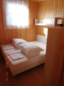 Postel nebo postele na pokoji v ubytování MARINA