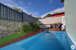 Bazén v ubytování Villa du Toucan Bleu - 4 étoiles - Piscine - Lagon de Saint-Leu nebo v jeho okolí
