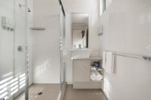 Koupelna v ubytování Smart Stayzzz Inns + 24 fotografií