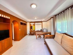 אזור ישיבה ב-Huen Him Kong Hotel Phrae