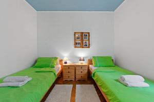 Voodi või voodid majutusasutuse Apartment Impreza Vabriga toas