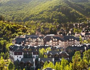 a group of houses in a town with a mountain at Beaver Creek St James 4 Bedroom in Beaver Creek