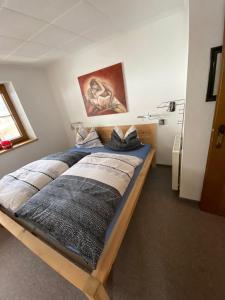 a bedroom with two beds in a room at Reiter, Haus in Finkenberg