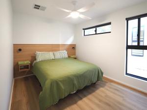 Postel nebo postele na pokoji v ubytování Ardrossan Caravan Park