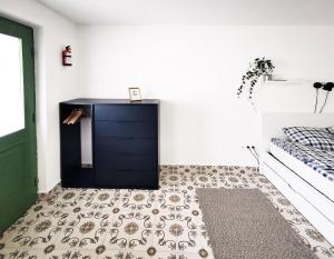 Posteľ alebo postele v izbe v ubytovaní Nest Apartman