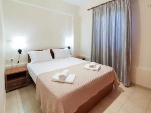 Ένα ή περισσότερα κρεβάτια σε δωμάτιο στο Dina's Apartment
