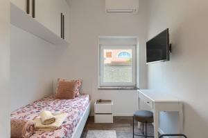 Posteľ alebo postele v izbe v ubytovaní Villa Giorgina