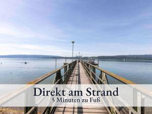 a pier on the water with text overlay ditch an stand million anr hub at Liggeringen in Radolfzell am Bodensee