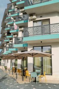 Balkón nebo terasa v ubytování NOVUS Hotel