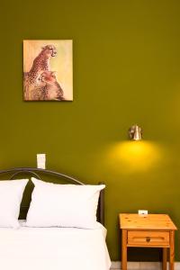 A bed or beds in a room at Southgate Apartments