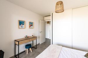 Postel nebo postele na pokoji v ubytování L'étincelle de Stagnola - Vue mer
