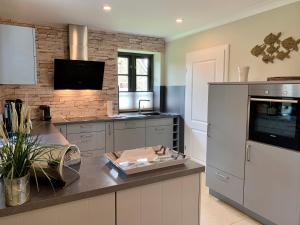 Dapur atau dapur kecil di Ferienhaus DHH "Meer und Flair"
