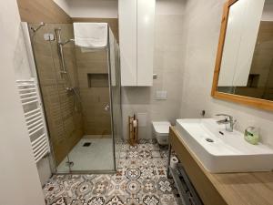Kúpeľňa v ubytovaní Apartament DOMANIS z widokiem na góry + 8 fotografií