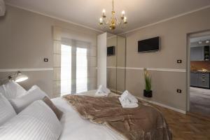 Posteľ alebo postele v izbe v ubytovaní Luxury Apartment Nina with heated swimming pool, Villa Adriatic