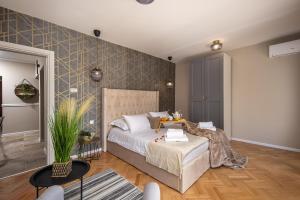 Posteľ alebo postele v izbe v ubytovaní Luxury Apartment Nina with heated swimming pool, Villa Adriatic