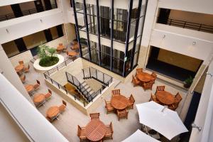 an overhead view of a restaurant with tables and chairs at Hotel WBF Grande Hakata in Fukuoka