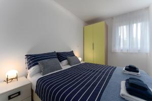 Katil atau katil-katil dalam bilik di Apartment Sky