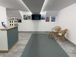 Foto da galeria de Hotel Playa de Sardiñeiro em Finisterre