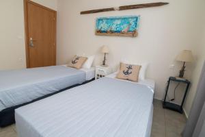 Postel nebo postele na pokoji v ubytování Ionian View Apartment
