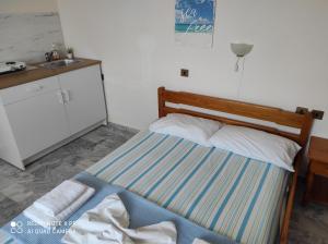 Postel nebo postele na pokoji v ubytování Golden Beach Sea View