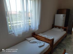 Postel nebo postele na pokoji v ubytování Golden Beach Sea View