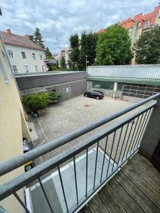 a car parked in a parking lot next to a building at Zentrum & Schöne Terasse in Graz