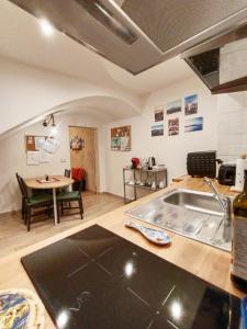 Et opholdsområde på EtnaCiTy Guest House Apartment + 37 billeder