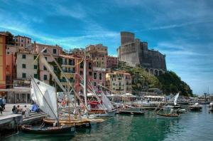 a group of boats docked in a harbor with buildings at Fantastic Luxury Apartments in Lerici in Lerici