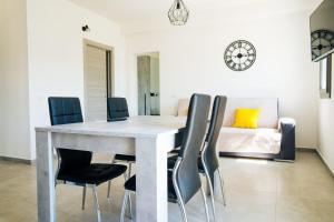 Posedenie v ubytovaní Casa Vacanze Oltre La Caletta - 350 mt dalla spiaggia