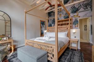 Postel nebo postele na pokoji v ubytování Palm River Hotel + 37 fotografií