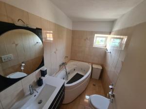 Kúpeľňa v ubytovaní Villa Goda