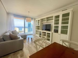 TV a/nebo společenská místnost v ubytování Mirador Poniente Beach